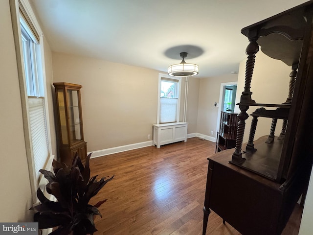 117 E Montgomery Ave, Hatboro, PA 19040 - foyer entrance featuring wood finished floors, baseboards, and radiator