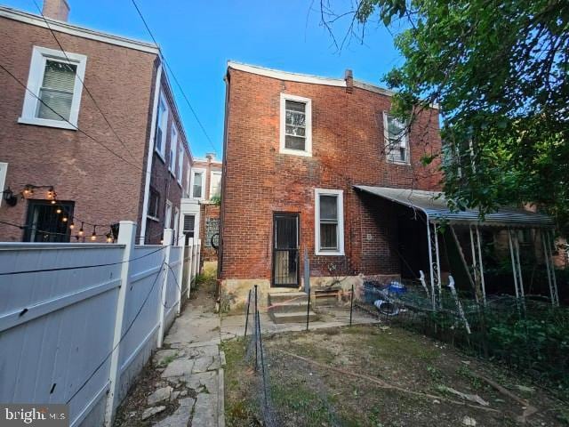 634 N 56th St, Philadelphia, PA 19131 - rear view of property featuring brick siding