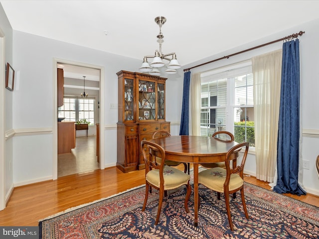 6 Stine Ct, Middletown, MD 21769 - dining area with light wood-style flooring and a chandelier