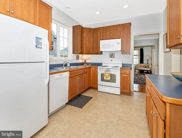 6 Stine Ct, Middletown, MD 21769 - kitchen with white appliances, healthy amount of natural light, brown cabinetry, and recessed lighting