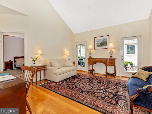 6 Stine Ct, Middletown, MD 21769 - living area featuring light wood-style flooring and high vaulted ceiling