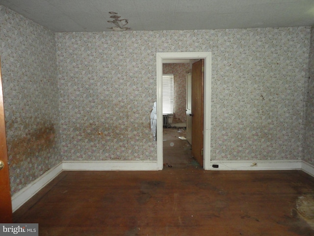 11 W Glendale Ave, Pleasantville, NJ 08232 - unfurnished room with wood finished floors, baseboards, and wallpapered walls