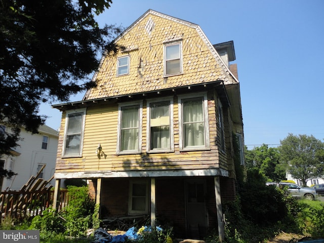 11 W Glendale Ave, Pleasantville, NJ 08232 - back of house with a gambrel roof and covered porch