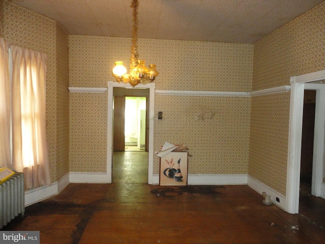 11 W Glendale Ave, Pleasantville, NJ 08232 - unfurnished dining area featuring radiator heating unit, a chandelier, hardwood / wood-style flooring, wallpapered walls, and baseboards
