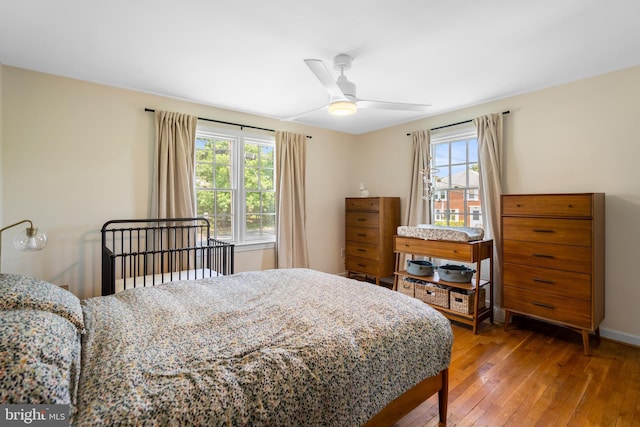 5600 11th St N, Arlington, VA 22205 - bedroom featuring wood-type flooring and a ceiling fan