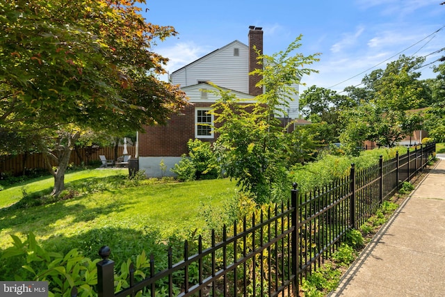 5600 11th St N, Arlington, VA 22205 - view of home's exterior with brick siding and a chimney