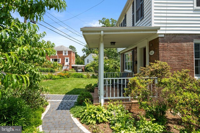 5600 11th St N, Arlington, VA 22205 - view of yard featuring covered porch