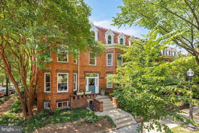 1800 Lamont St NW, Washington, DC 20010 - view of front of home with mansard roof and brick siding