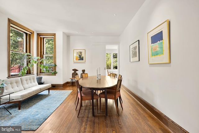 1800 Lamont St NW, Washington, DC 20010 - dining room with plenty of natural light, dark wood-style floors, and baseboards