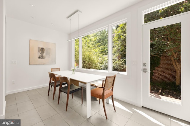 1800 Lamont St NW, Washington, DC 20010 - dining area featuring healthy amount of natural light, baseboards, and light tile patterned floors