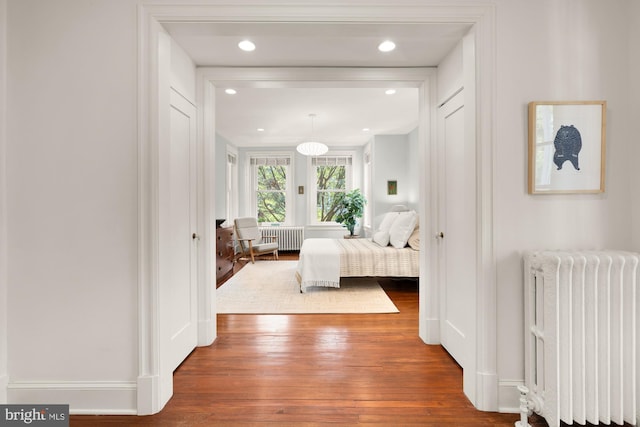 1800 Lamont St NW, Washington, DC 20010 - bedroom with radiator heating unit, hardwood / wood-style floors, and recessed lighting