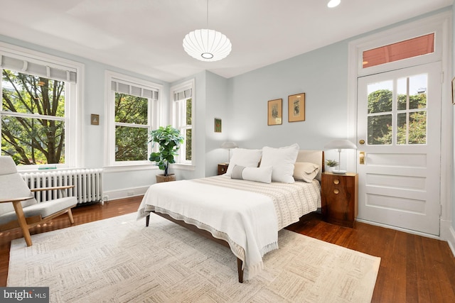1800 Lamont St NW, Washington, DC 20010 - bedroom featuring radiator heating unit, dark wood-style flooring, and recessed lighting