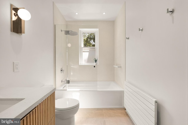 1800 Lamont St NW, Washington, DC 20010 - bathroom with radiator, toilet, vanity, and tile patterned flooring