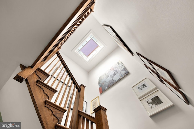 1800 Lamont St NW, Washington, DC 20010 - staircase with high vaulted ceiling and beam ceiling