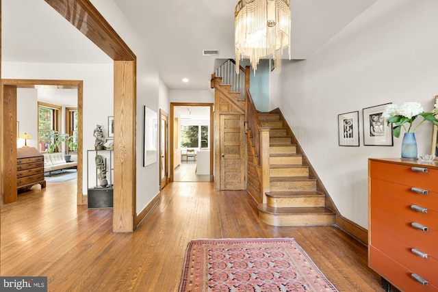 1800 Lamont St NW, Washington, DC 20010 - entryway featuring wood finished floors, stairway, baseboards, and recessed lighting