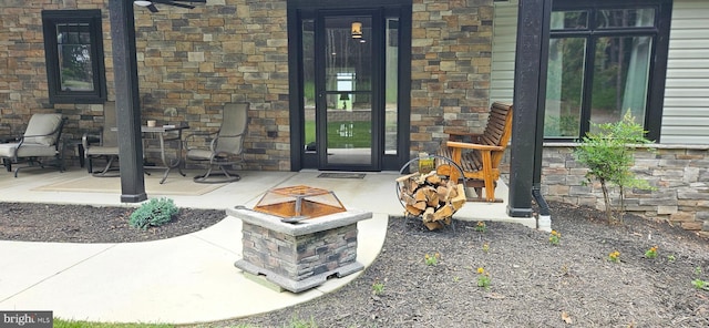 2204 Baker Mountain Dr, Yellow Spring, WV 26865 - property entrance with stone siding and a patio