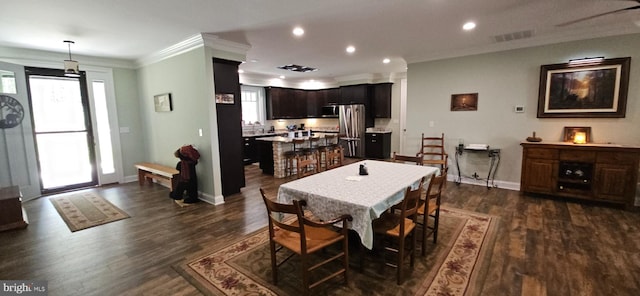 2204 Baker Mountain Dr, Yellow Spring, WV 26865 - dining room with crown molding, dark wood-type flooring, and recessed lighting