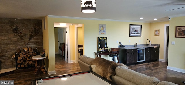 2204 Baker Mountain Dr, Yellow Spring, WV 26865 - living room with wet bar, wine cooler, dark wood-style floors, crown molding, and recessed lighting