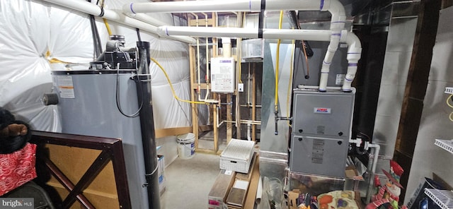 2204 Baker Mountain Dr, Yellow Spring, WV 26865 - utility room featuring water heater