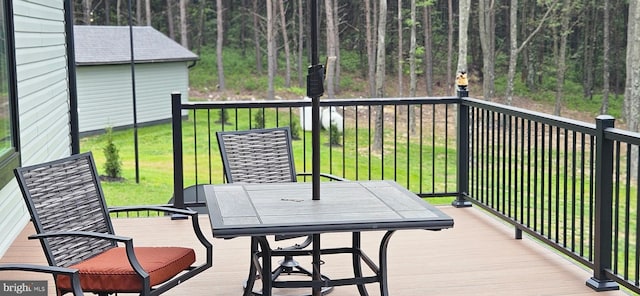 2204 Baker Mountain Dr, Yellow Spring, WV 26865 - deck featuring a lawn, outdoor dining area, and a forest view