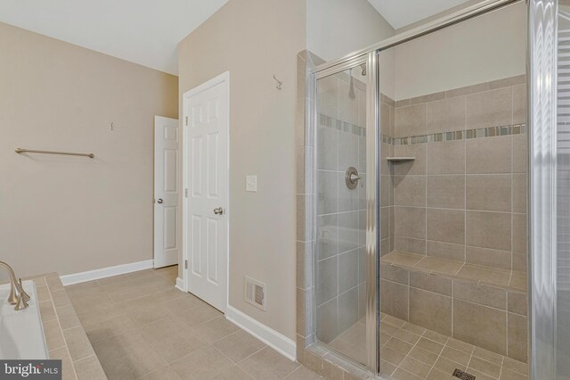 22277 Foggy Ridge Ter, Ashburn, VA 20148 - bathroom with a shower stall, tile patterned floors, and baseboards