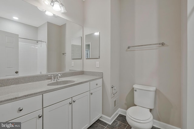 22277 Foggy Ridge Ter, Ashburn, VA 20148 - full bathroom with toilet, baseboards, vanity, tile patterned flooring, and a shower