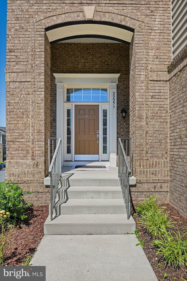 22277 Foggy Ridge Ter, Ashburn, VA 20148 - property entrance featuring brick siding