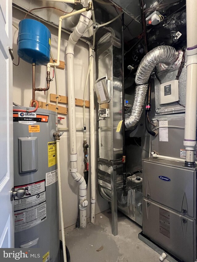 22277 Foggy Ridge Ter, Ashburn, VA 20148 - utility room featuring electric water heater