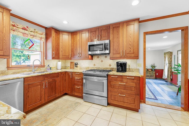 1541 Clayton Delaney Rd, Clayton, DE 19938 - kitchen featuring appliances with stainless steel finishes, a sink, tasteful backsplash, light stone counters, and recessed lighting
