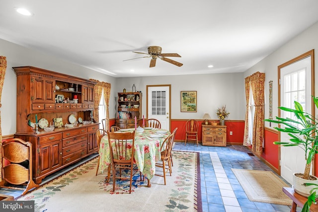 1541 Clayton Delaney Rd, Clayton, DE 19938 - dining room with healthy amount of natural light, a ceiling fan, recessed lighting, wainscoting, and tile patterned floors