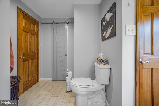 1541 Clayton Delaney Rd, Clayton, DE 19938 - bathroom with toilet, wood finished floors, and baseboards