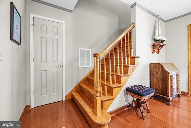 1541 Clayton Delaney Rd, Clayton, DE 19938 - stairway with ornamental molding, wood finished floors, and baseboards