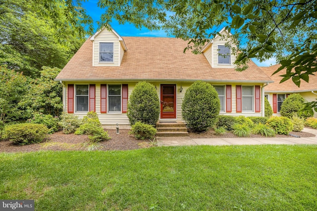 1541 Clayton Delaney Rd, Clayton, DE 19938 - new england style home featuring a front lawn and a shingled roof