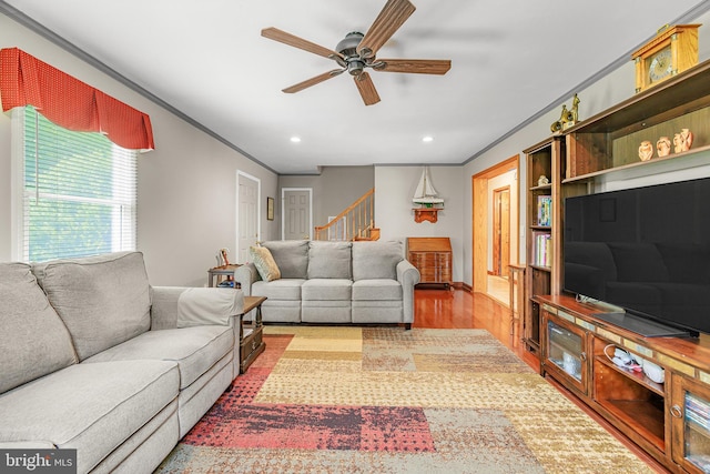 1541 Clayton Delaney Rd, Clayton, DE 19938 - living area with crown molding, a ceiling fan, stairs, recessed lighting, and wood finished floors