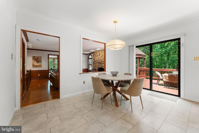 15713 Holly Grove Rd, Silver Spring, MD 20905 - dining space with crown molding and light tile patterned floors
