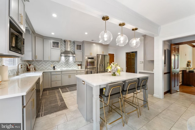 15713 Holly Grove Rd, Silver Spring, MD 20905 - kitchen with stainless steel appliances, wall chimney range hood, gray cabinets, decorative backsplash, and a sink