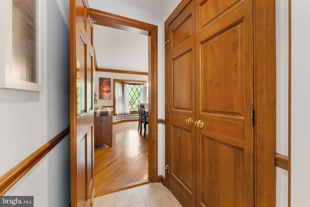 15713 Holly Grove Rd, Silver Spring, MD 20905 - hall with light wood finished floors and ornamental molding