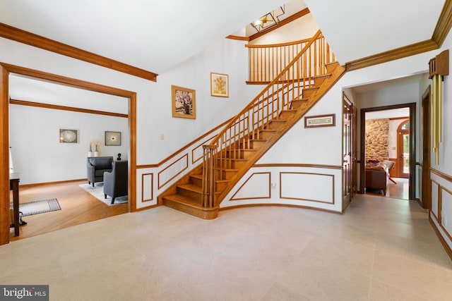 15713 Holly Grove Rd, Silver Spring, MD 20905 - staircase featuring crown molding
