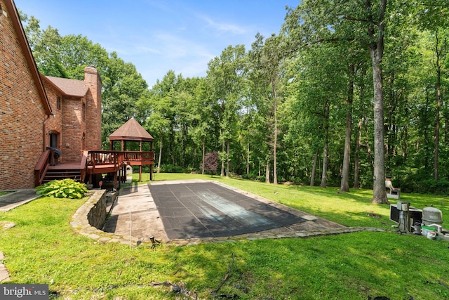 15713 Holly Grove Rd, Silver Spring, MD 20905 - view of green lawn featuring a gazebo, a deck, and a patio