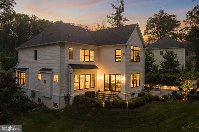 717 Miller Ave, Great Falls, VA 22066 - back of property featuring a lawn