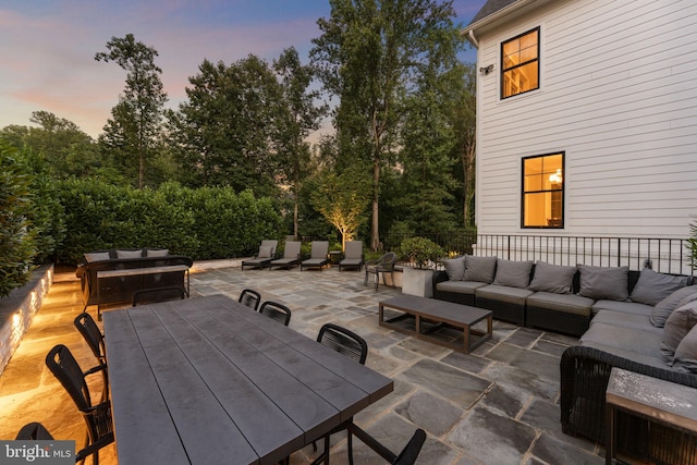 717 Miller Ave, Great Falls, VA 22066 - patio terrace at dusk with outdoor lounge area, a patio area, and outdoor dining area