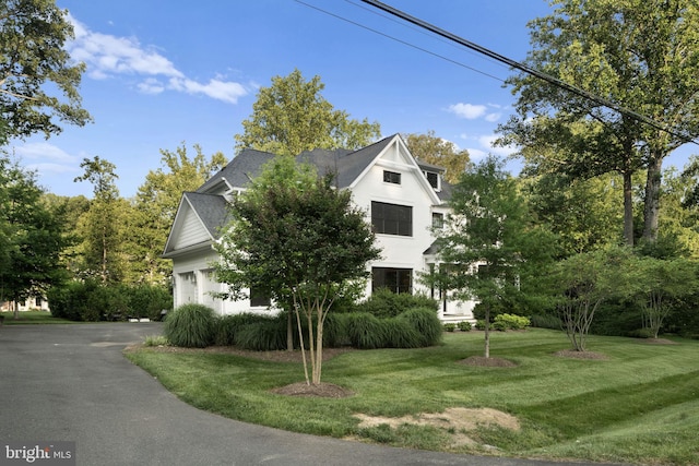 717 Miller Ave, Great Falls, VA 22066 - view of front of property with a front yard, driveway, and a garage
