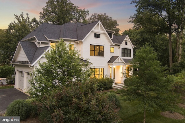 717 Miller Ave, Great Falls, VA 22066 - view of front facade featuring driveway and roof with shingles