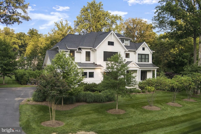 717 Miller Ave, Great Falls, VA 22066 - view of front facade featuring a front lawn and a shingled roof