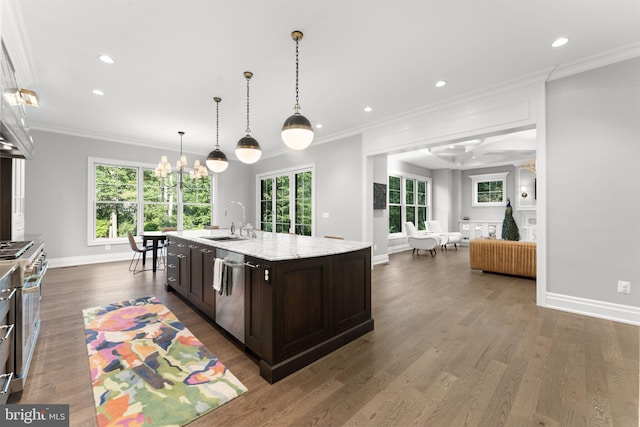 717 Miller Ave, Great Falls, VA 22066 - kitchen featuring stainless steel appliances, dark brown cabinets, dark wood-style flooring, light stone countertops, and an island with sink