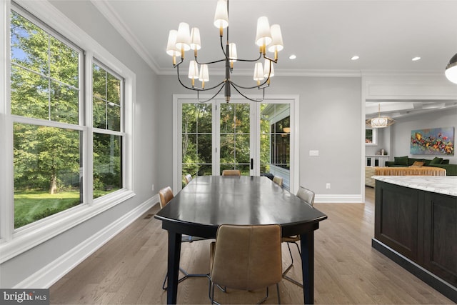 717 Miller Ave, Great Falls, VA 22066 - dining space with a chandelier, light wood finished floors, ornamental molding, and recessed lighting