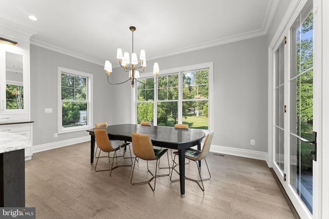 717 Miller Ave, Great Falls, VA 22066 - dining area with a chandelier, crown molding, light wood-style floors, and recessed lighting