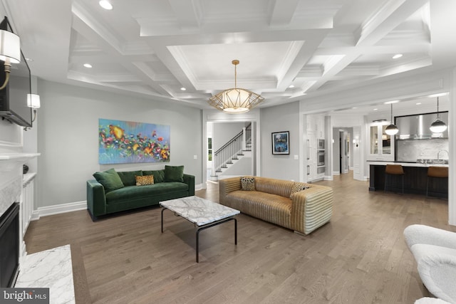 717 Miller Ave, Great Falls, VA 22066 - living room with a premium fireplace, stairs, wood finished floors, coffered ceiling, and beam ceiling