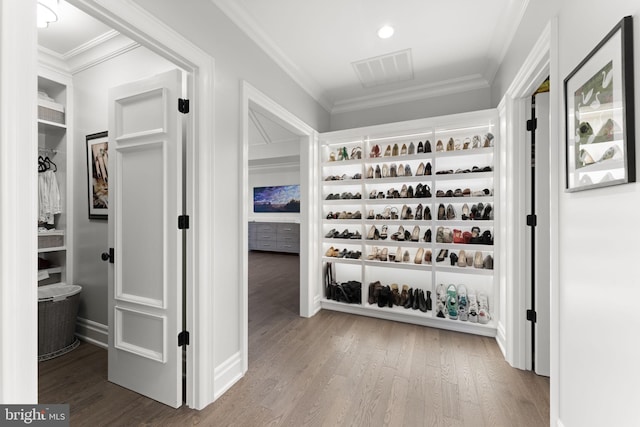 717 Miller Ave, Great Falls, VA 22066 - wine room featuring wood finished floors and ornamental molding