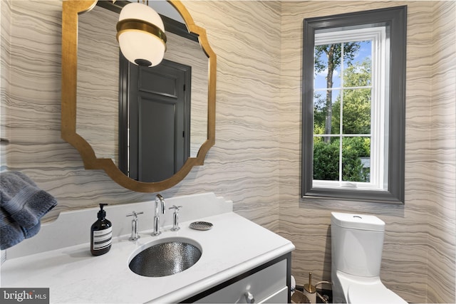 717 Miller Ave, Great Falls, VA 22066 - half bathroom featuring wallpapered walls and vanity
